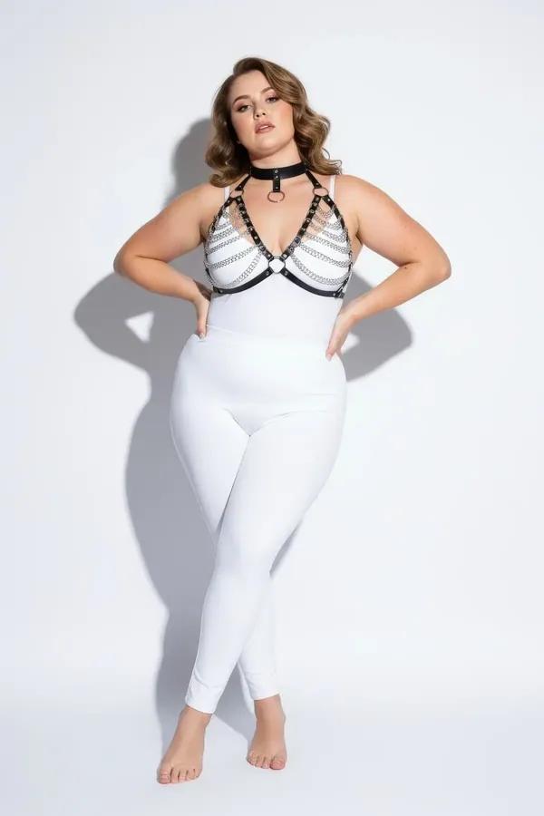 black faux leather chain detail chest harness with silver O-ring and matching choker collar on plus-size model