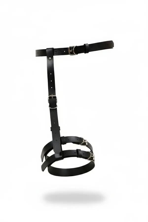 black faux leather single leg garter harness with dual thigh bands and silver D-ring buckles on white background