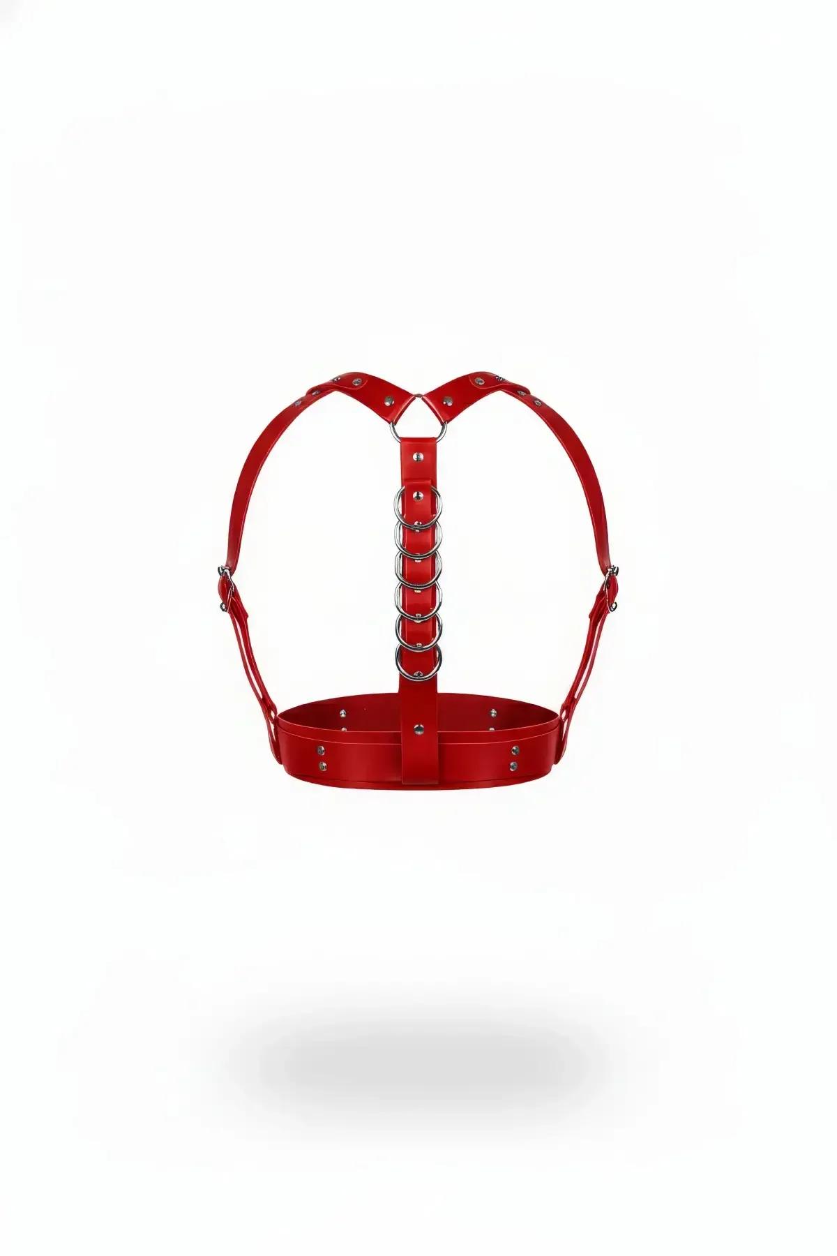Red faux leather underbust harness with five stacked silver O-rings on center front strap and wide rivet-detail band