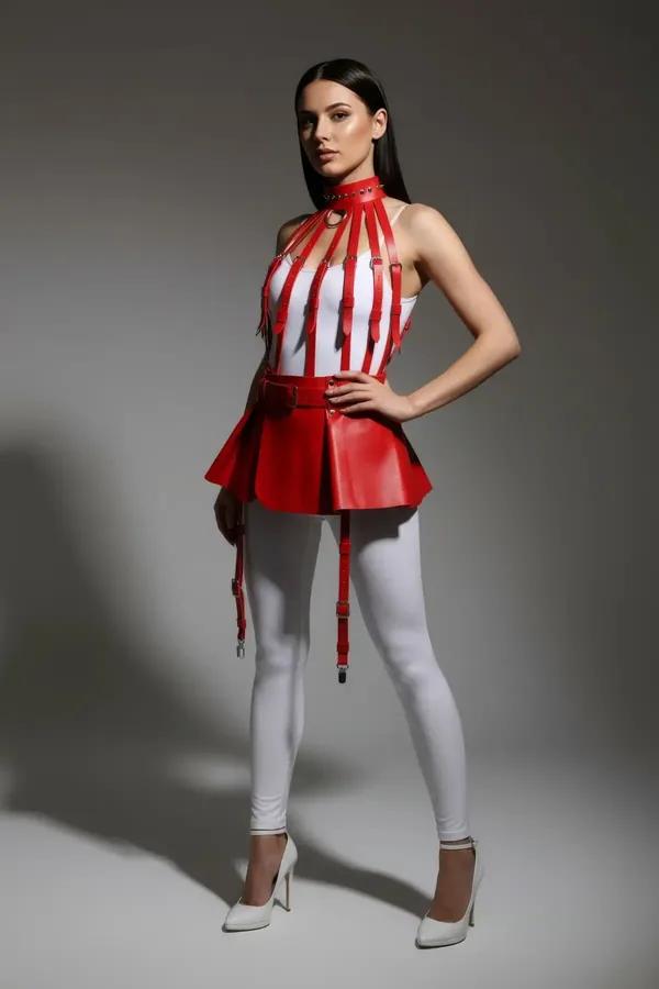 red faux leather cage harness with flared peplum skirt and four garter straps, silver O-ring hardware, high halter collar
