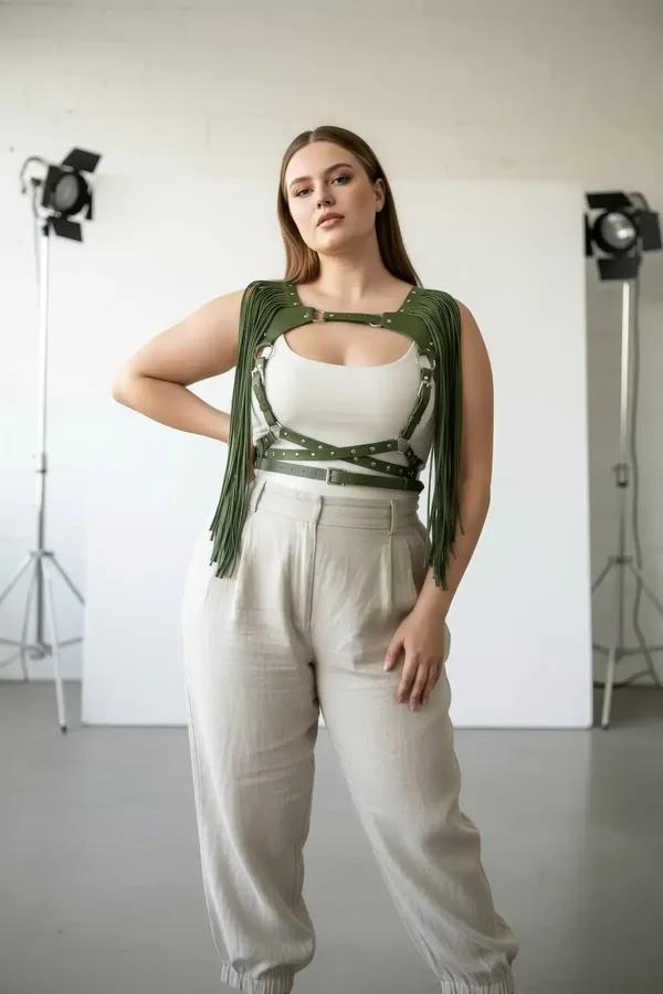 olive green fringed chest harness studded vegan leather straps silver buckles plus size model
