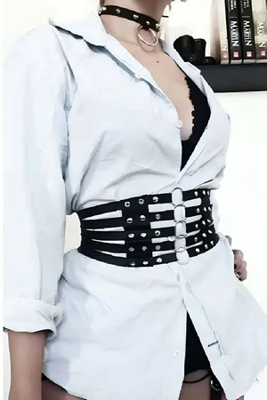 Black Faux Leather Multi-Strap Studded Underbust Harness Belt with Silver O-Rings Worn Over White Shirt