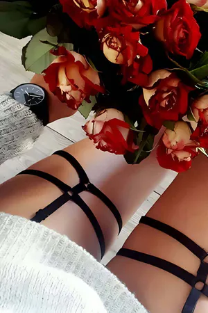 Black Elastic Multi-Strap Thigh Harness Set Worn on Leg with Soft Knitted Sweater