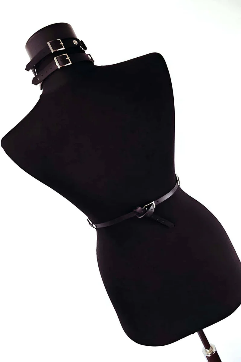 Black faux leather harness belt with buckle detail