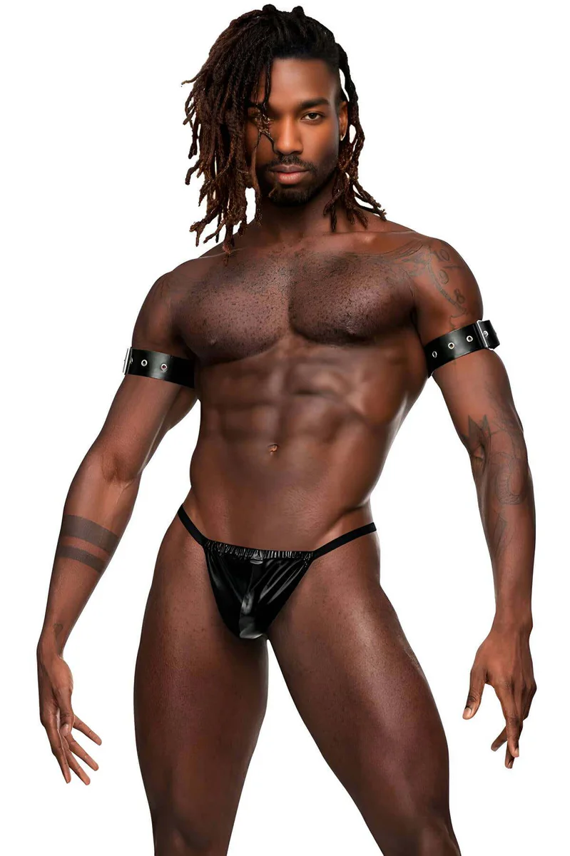 Close-up of silver o-ring hardware on black faux leather arm harness and g-string