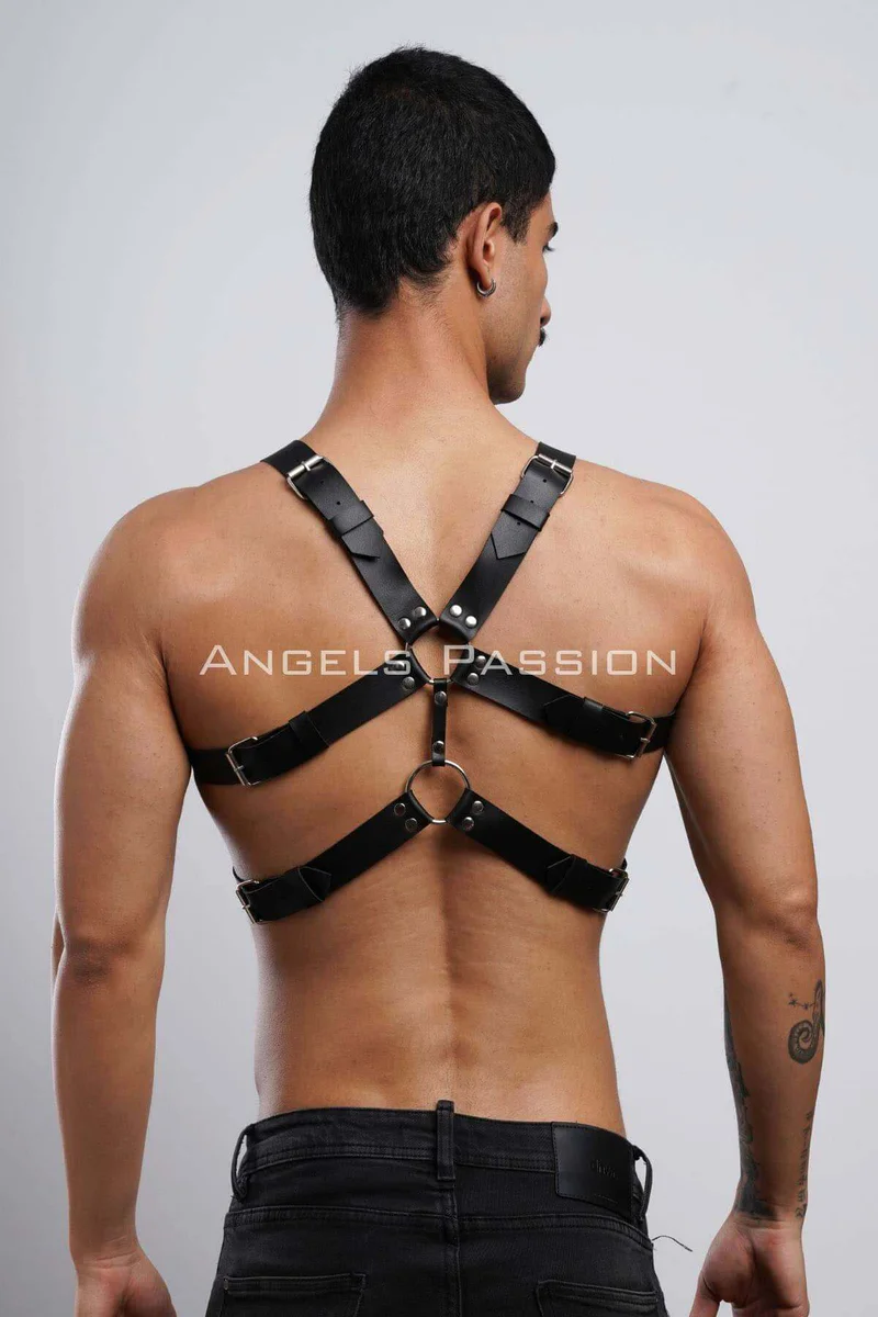 Black faux leather full body harness with O-ring details from behind