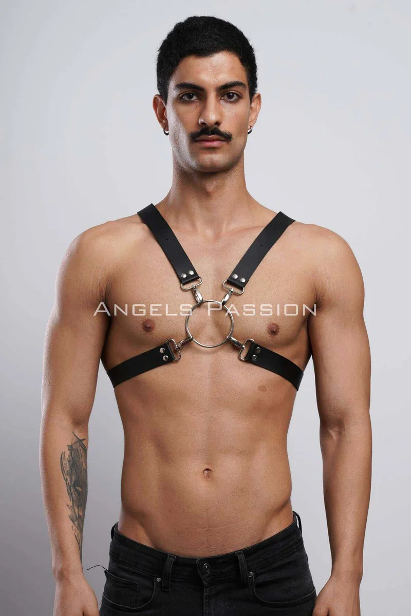 Black faux leather chest harness with silver O-ring and X-back straps