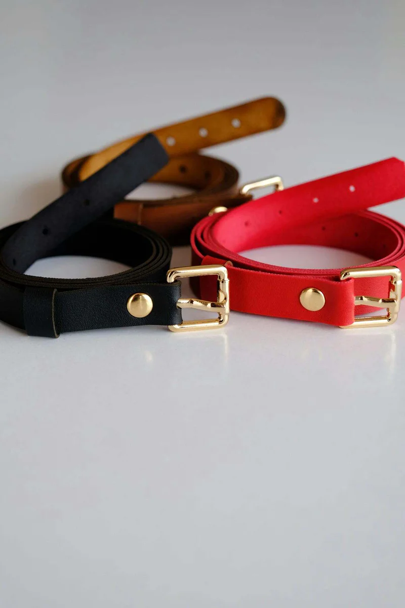 Black, Red, and Tan faux leather