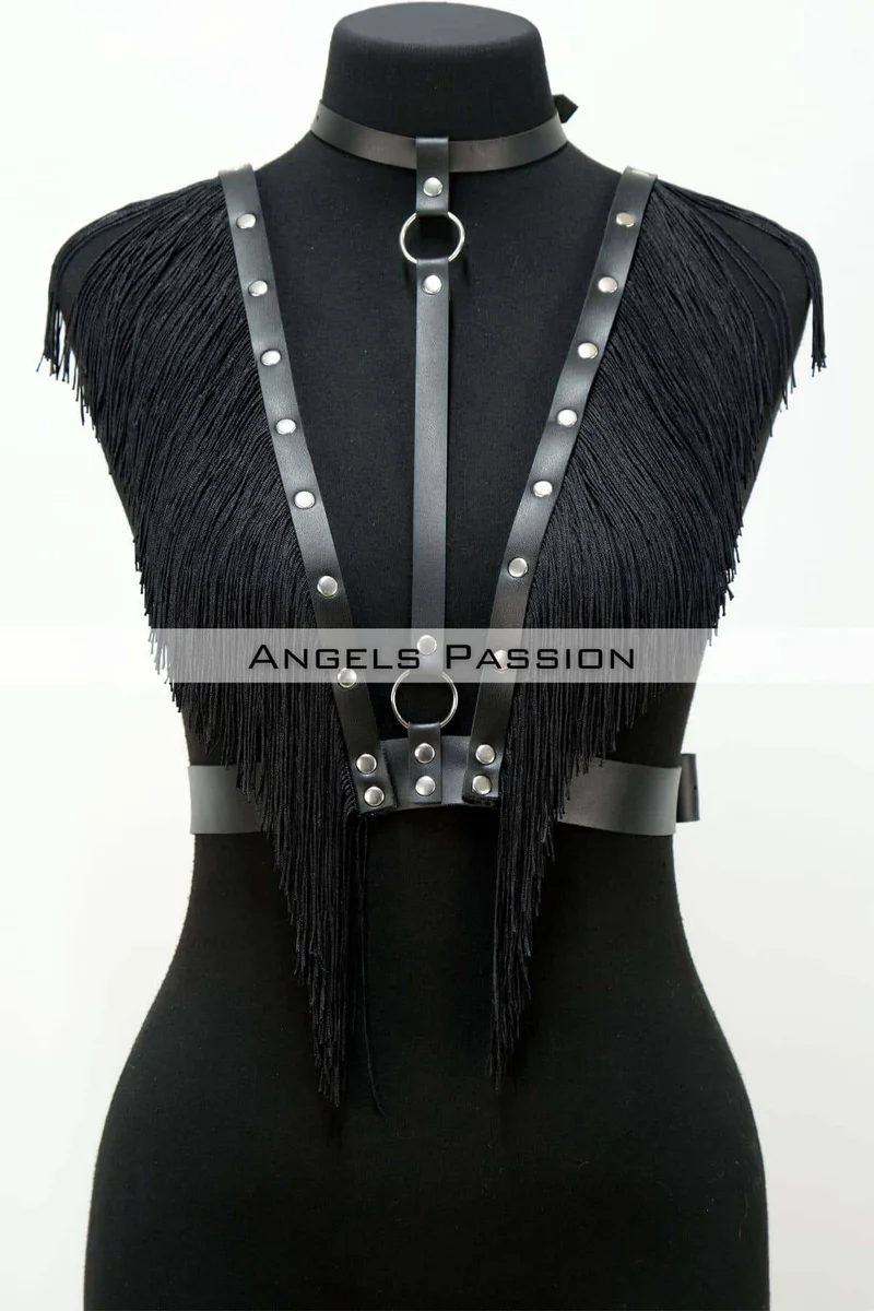 Black faux leather fringe chest harness on mannequin side view with silver hardware