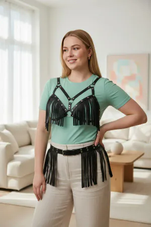 Black Fringe Faux Leather Chest Harness and Waist Belt Set worn over a cream top and mint trousers